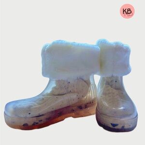 UGG clear Rain boots with a pair of socks